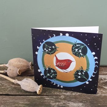 winterkoninkje in een mandala met maretak en sterren